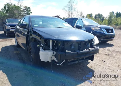 2014 Toyota Camry Le z USA, uszkodzony, nr VIN 4T4BF1FK2ER402576